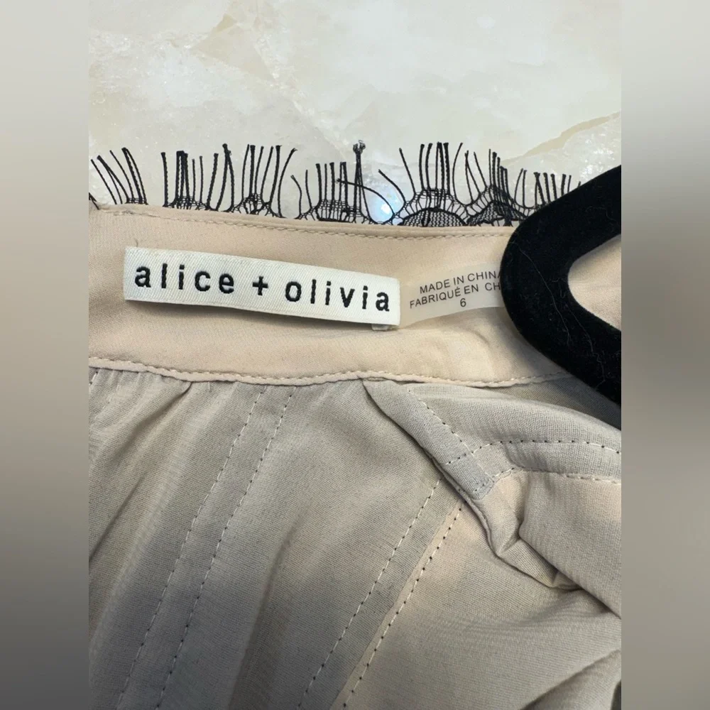 Alice + Olivia Black Lace Blouse. Like New!
Simply beautiful - Picture 7 of 7